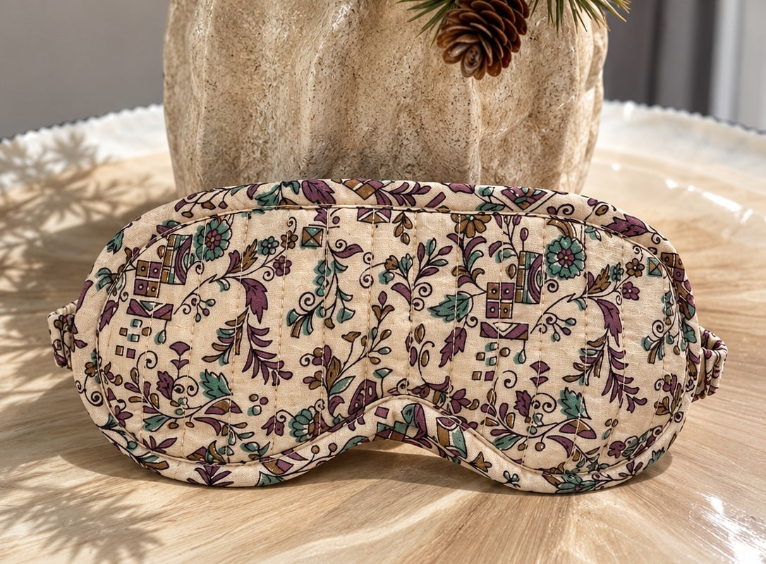 Beige blomstret sovemaske, forfra
