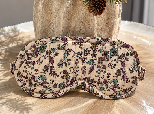 Beige blomstret sovemaske, forfra